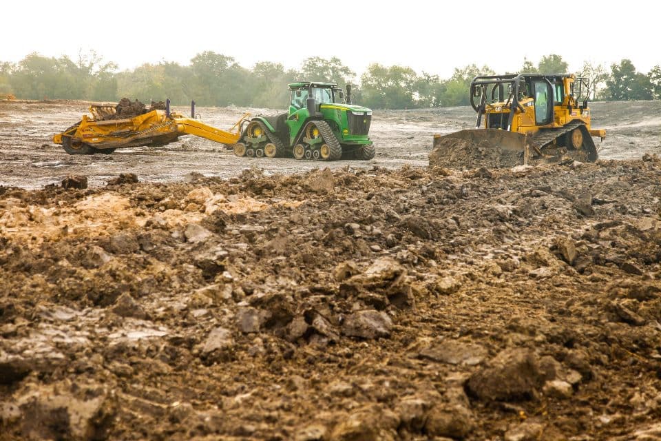 Tractors excavating a new lakebed