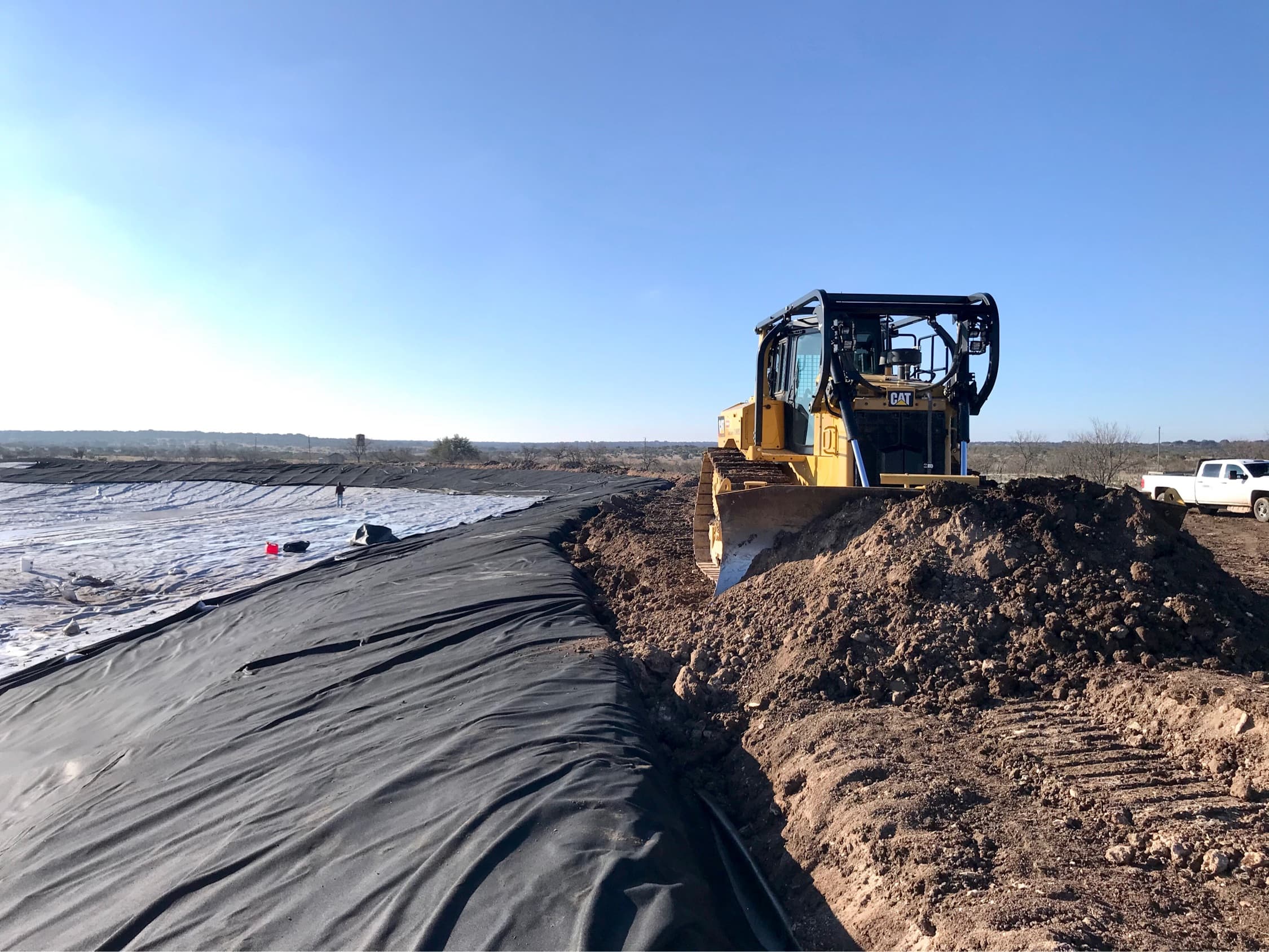 Seaming and securing the pond liner