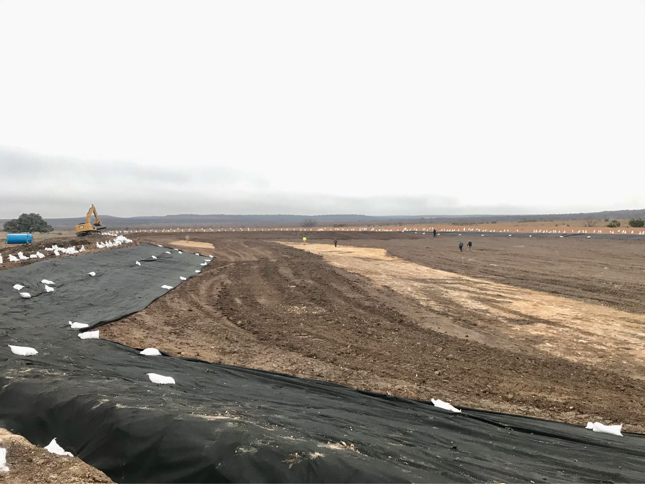 Cleared and graded ground after excavation on a ranch